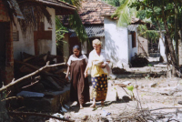 Jenny inspects this lady\'s devastated home